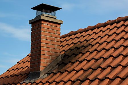 Nettoyage cheminées et souches de toit