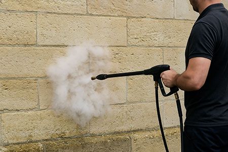 Nettoyage murs en pierre calcaire ou grès